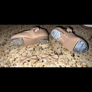 Capezio tap shoes. Barely worn before she outgrew.